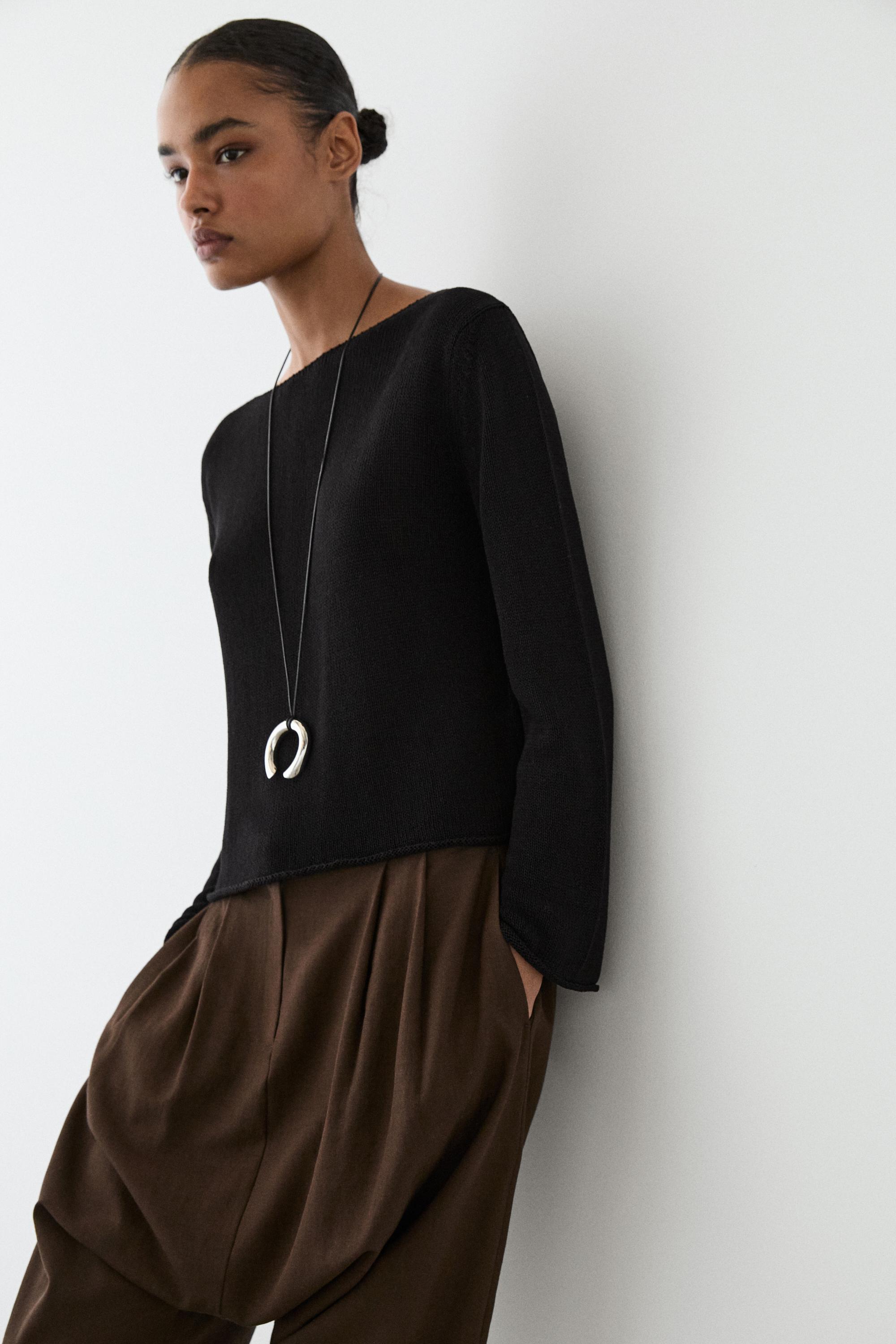 Flowing knit boat neck sweater